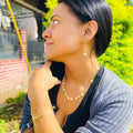 Coquette gold necklace