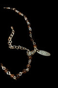 NY necklace with gold tone Accents and brown Beads