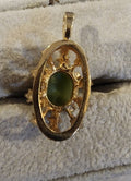 Elegant Pendent with Green Tigers eye gemstone accented with sparking clear stone