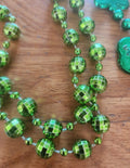 2 Green Mardi Gras Beads one Shamrocks says Budweiser and disco balls