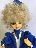 Collectible 1986 Brinn's Musical July Calendar Doll.