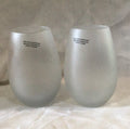 Two  Frosty wine glasses Drinks well with Others, wine taste better with friends
