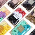 TANJY Black Hair Ties 100 Pcs Seamless Ponytail Holders Thick Hair