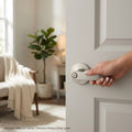 Kwikset Winston Privacy Door Lever Set with Round Rose from the SafeLock Series