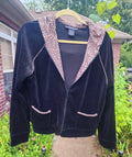 Classic black with a fun, eye-catching leopard print hood and pocket trim.