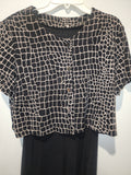 Black maxi dress paired with a short-sleeved top featuring a Giraffe Pattern M
