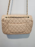 Quilted Leather beige purse with gold tone accents and chain.